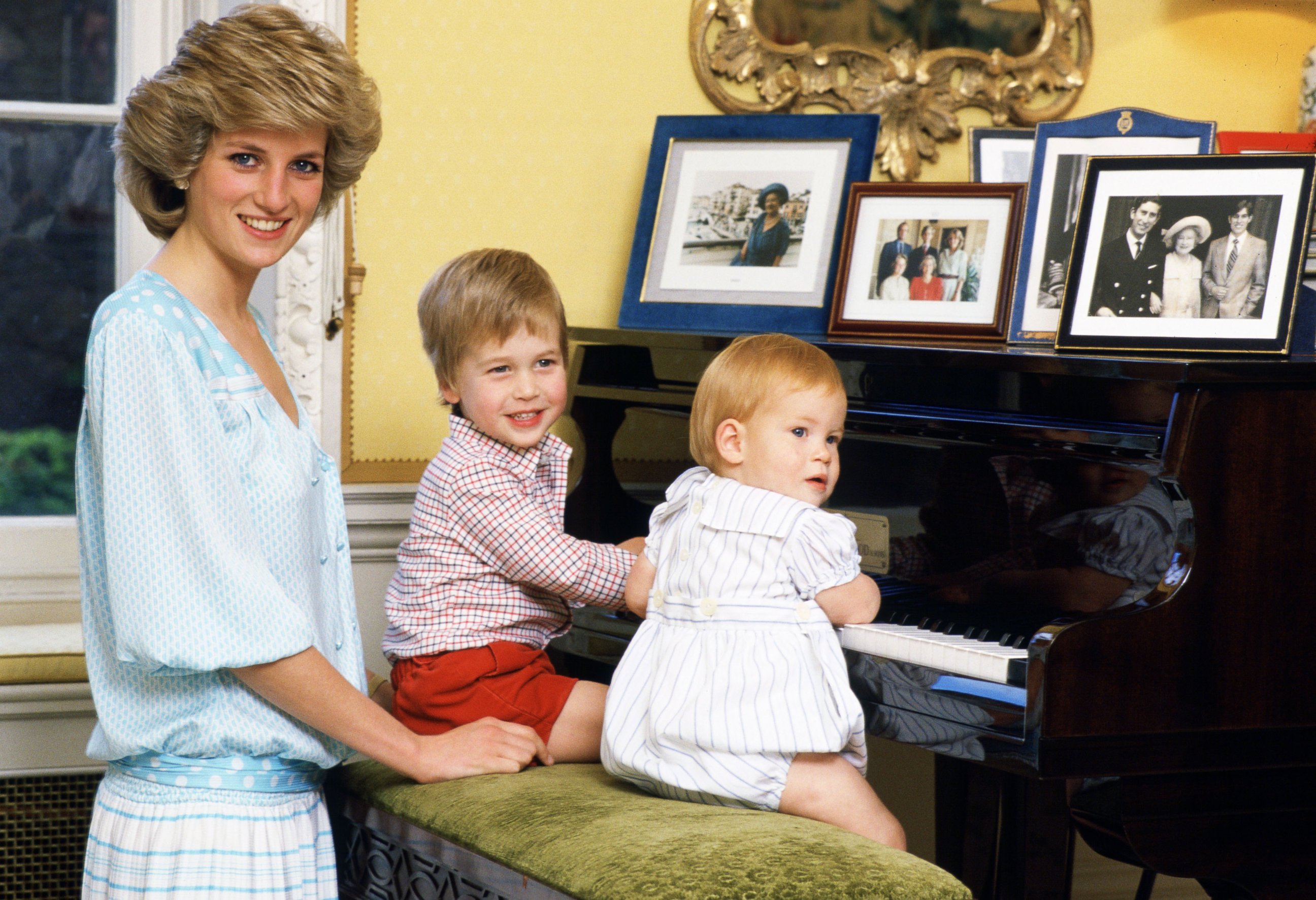 PHOTO: Diana, Princess of Wales is pictured with her sons, Prince William and Prince Harry, at the piano in Kensington Palace, Oct. 4, 1985 in London. 