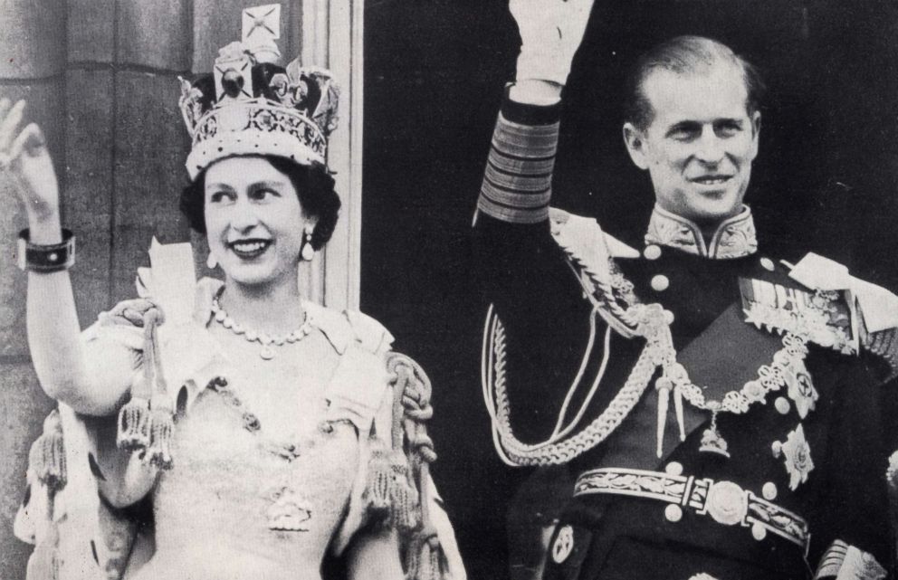 PHOTO: Queen Elizabeth II and Prince Phillip wave from Buckingham Palace in London following the coronation in 1953. 