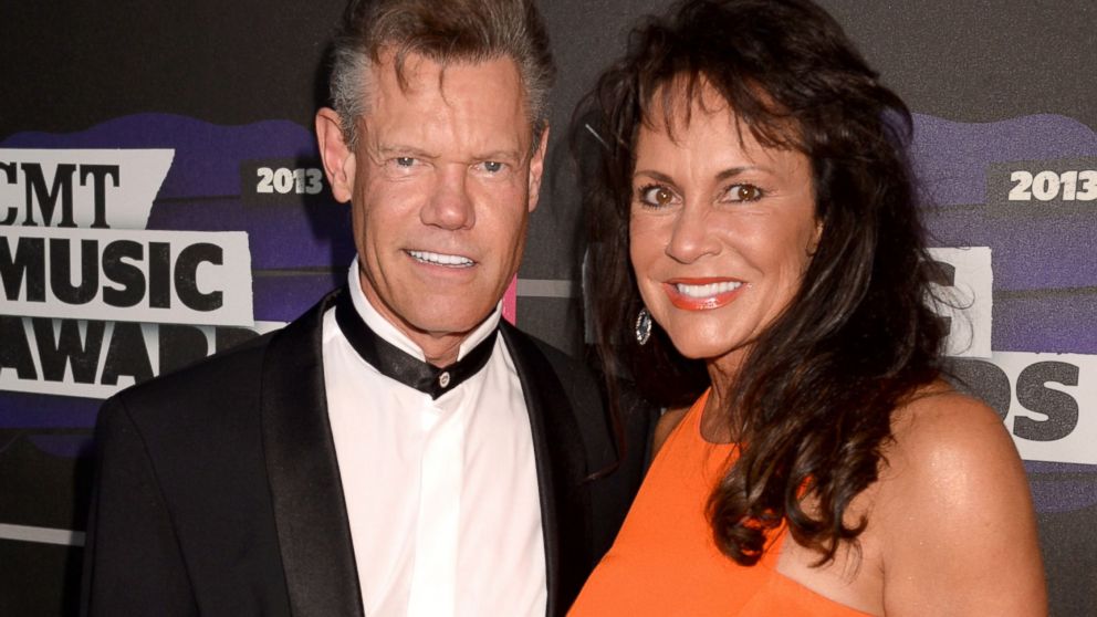 PHOTO: Randy Travis and Mary Beougher arrive at the 2013 CMT Music Awards at the Bridgestone Arena, June 5, 2013, in Nashville.