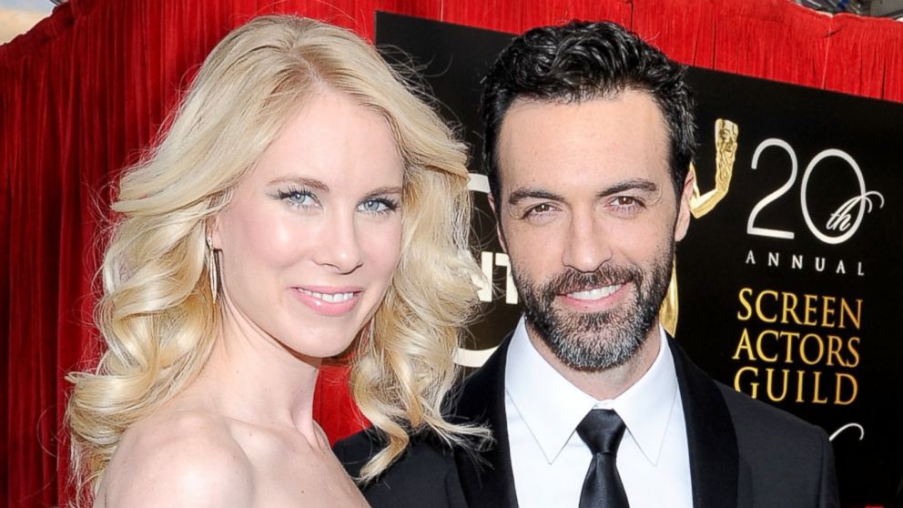 Actor Reid Scott and Elspeth Keller attend the 20th Annual Screen Actors Guild Awards at The Shrine Auditorium on January 18, 2014 in Los Angeles, California.