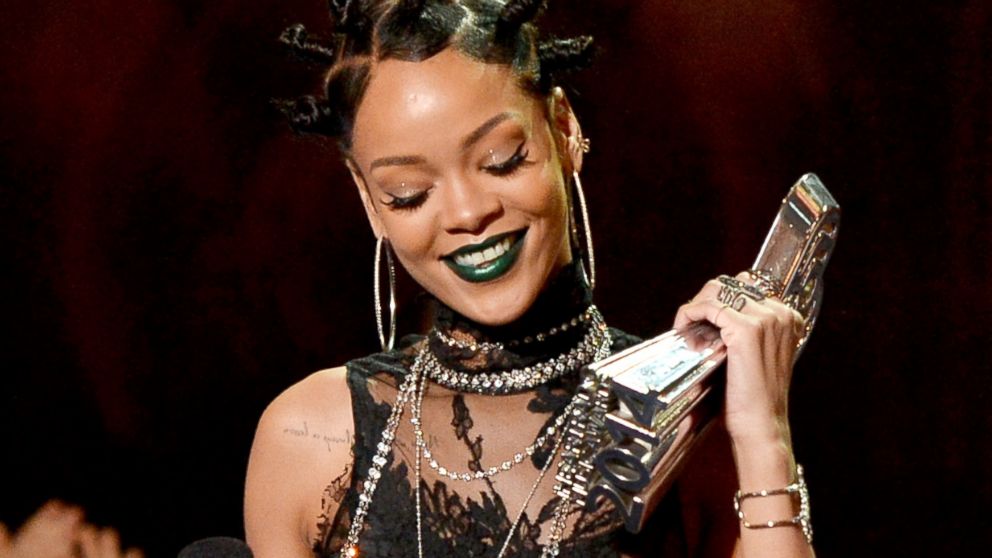 Singer Rihanna accepts the Artist of the Year award onstage during the 2014 iHeartRadio Music Awards at The Shrine Auditorium, May 1, 2014, in Los Angeles. 