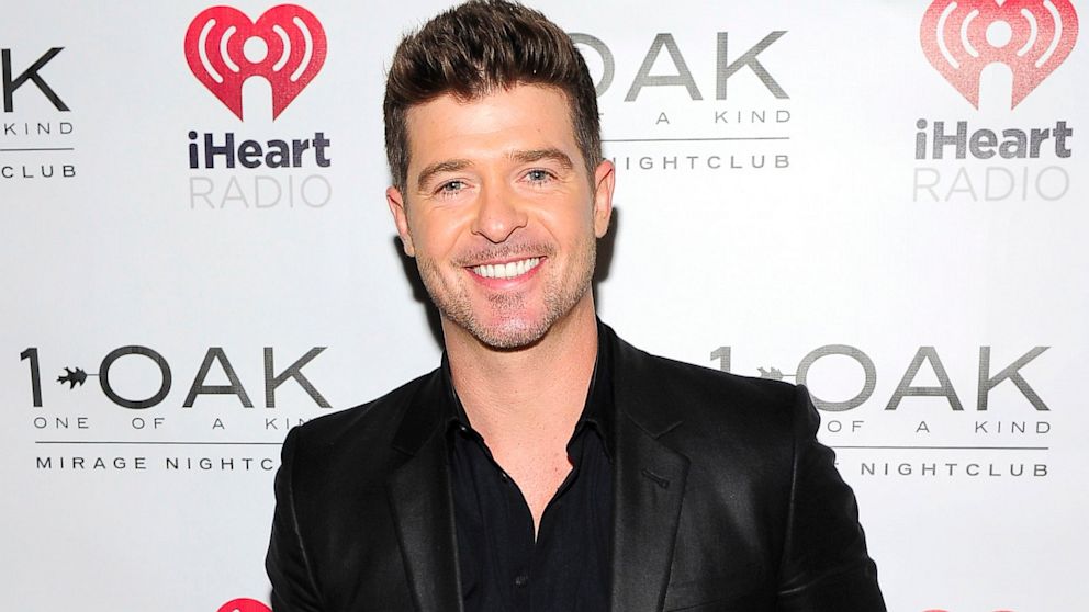 Robin Thicke arrives for the official IHeartRadio after party at 1 Oak Nightclub at The Mirage in Las Vegas, Sept. 20, 2013.