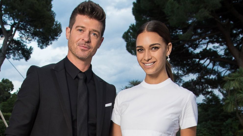 Robin Thicke and April Love Geary are pictured on May 21, 2015 in Cap d'Antibes, France.  