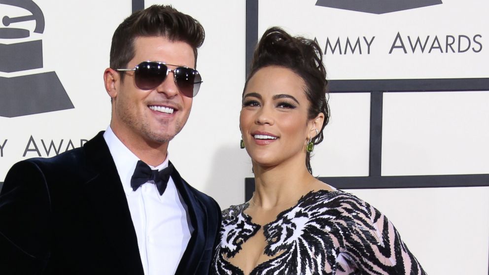 Robin Thicke and Paula Patton arrive at the 20th Annual Screen Actors Guild Awards at the Shrine Auditorium, Jan. 18, 2014 in Los Angeles, Calif.