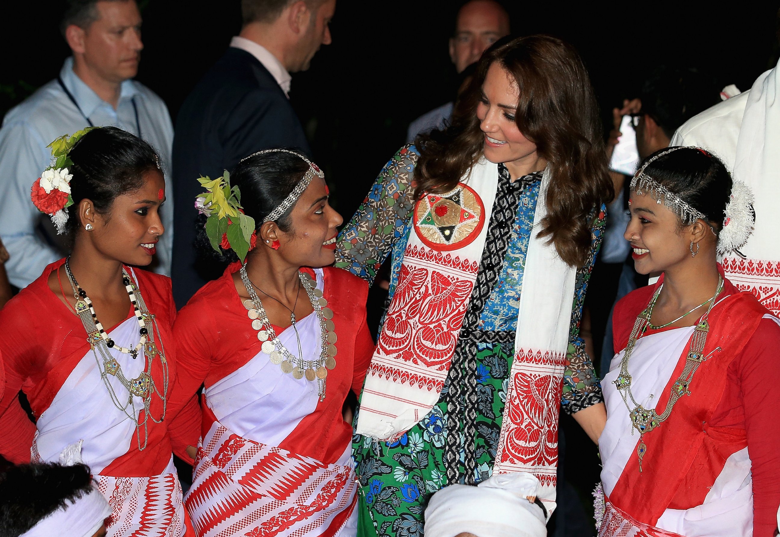 PHOTO:Catherine, Duchess of Cambridge with dancers by the fireside during a Bihu Festival Celebration at Diphlu River Lodge, April 12, 2016, in Kaziranga, India. 