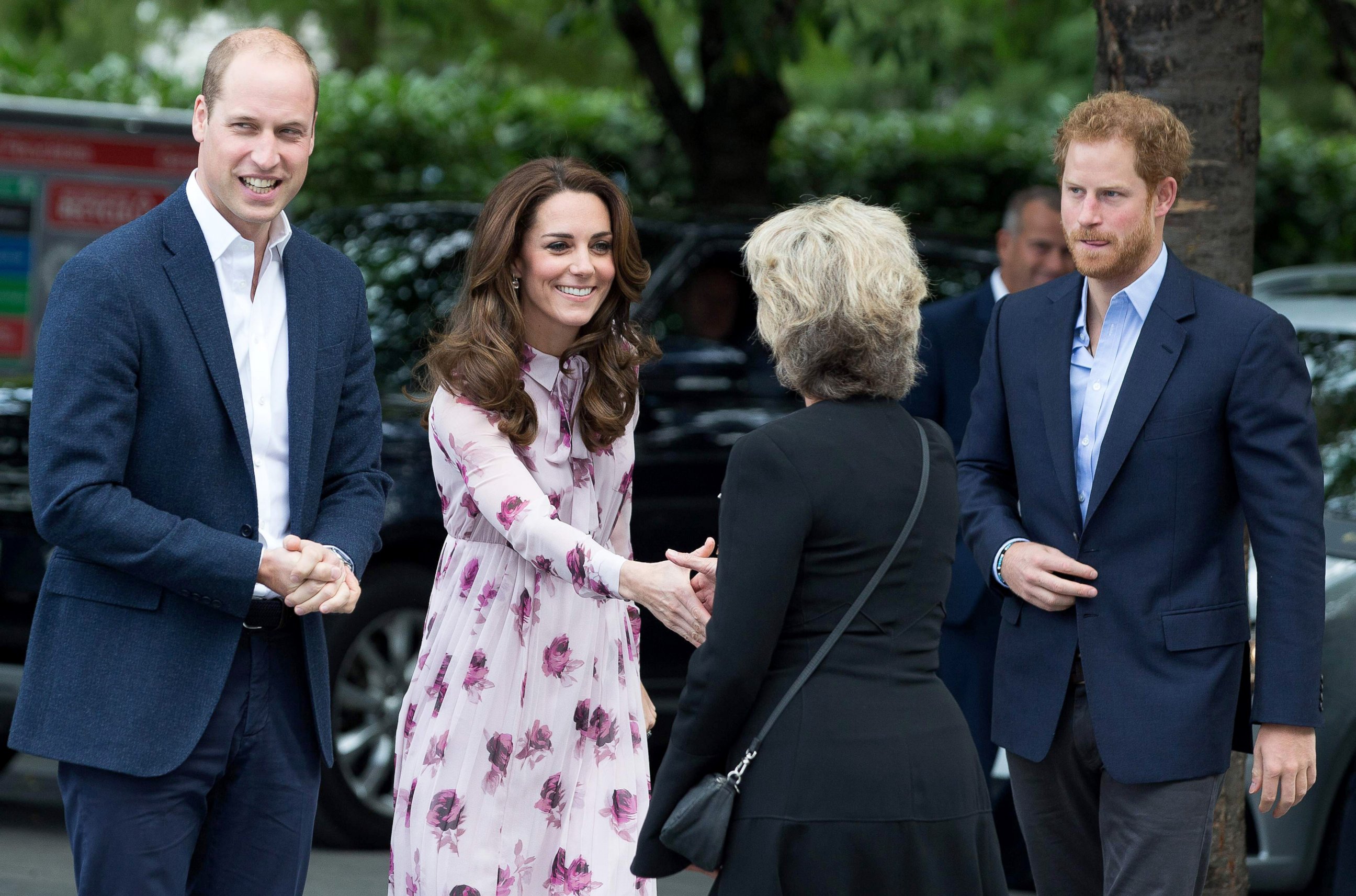 PHOTO: Britain's Prince William, Duke of Cambridge, Catherine, Duchess of Cambridge and Prince Harry are greeted as they arrive for a visit to County Hall and The London Eye Oct. 10, 2016, in London.