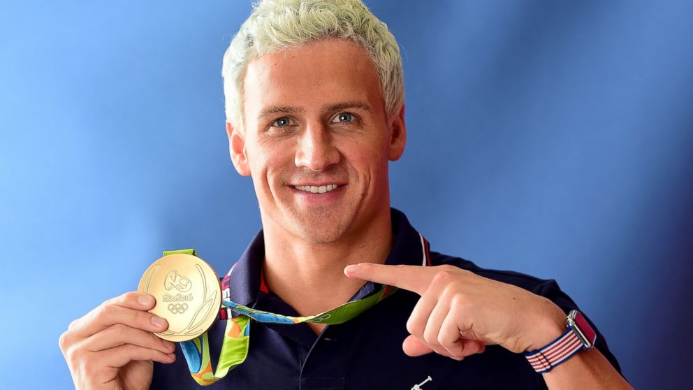 PHOTO: Swimmer, Ryan Lochte of the United States poses for a photo with his gold medal, Aug. 12, 2016, in Rio de Janeiro.