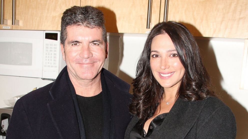 Simon Cowell, left, and partner Lauren Silverman, right, are pictured on Jan. 25, 2014 in New York City.  