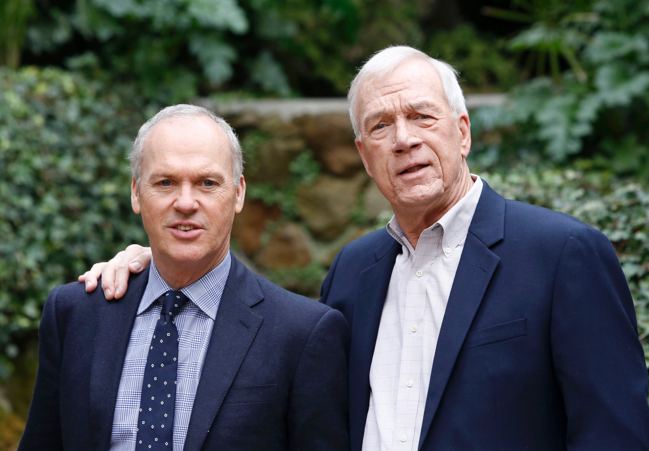 PHOTO: Michael Keaton and journalist Walter Robinson, right, attenda photocall to present the movie "Spotlight," Jan. 23, 2016, in Rome.