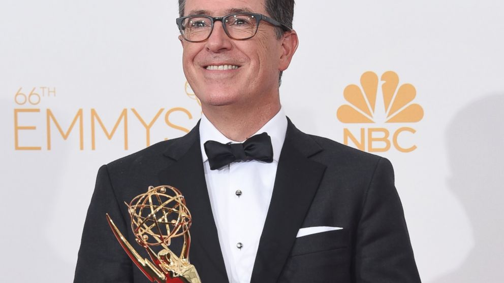 Writer/Producer/Host Stephen Colbert, winner of the for Outstanding Variety Series Award for The Colbert Report, poses in the press room during the 66th Annual Primetime Emmy Awards held at Nokia Theatre L.A. Live, Aug. 25, 2014 in Los Angeles.