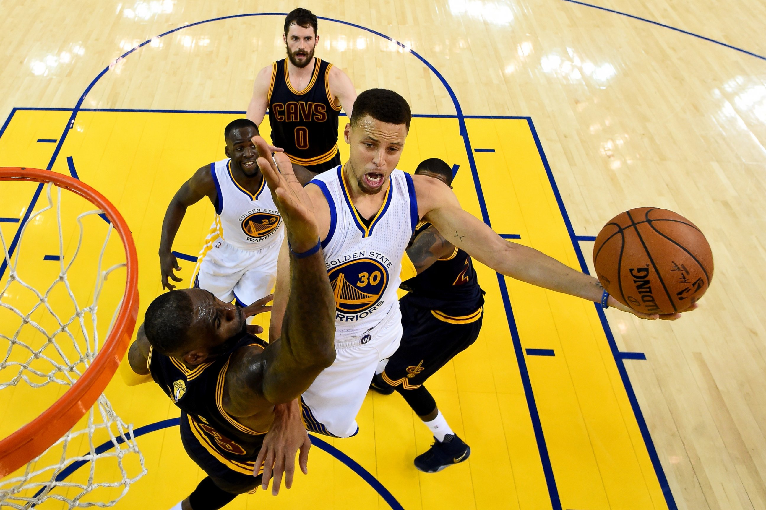PHOTO: Stephen Curry of the Golden State Warriors goes up for a shot against LeBron James of the Cleveland Cavaliers in Game 2 of the 2016 NBA Finals, June 5, 2016, in Oakland, California.