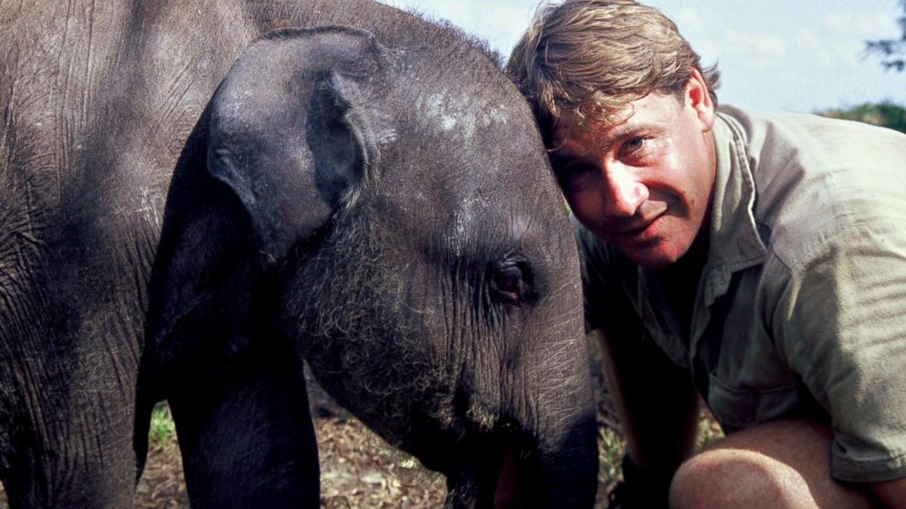 Steve Irwin poses with an elephant at Australia Zoo in this Sept. 16, 2006 file photo in Beerwah, Australia.