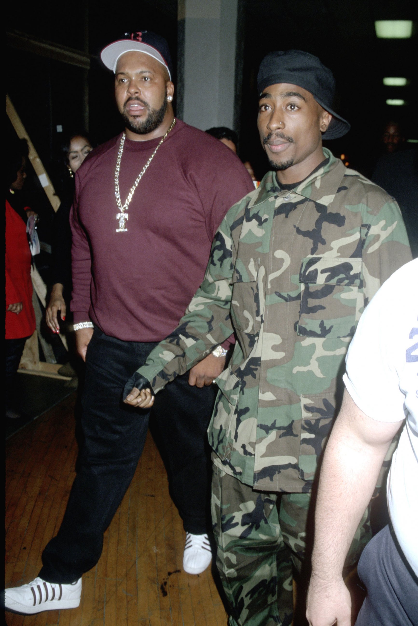 PHOTO: Suge Knight, left, and Tupac Shakur, right, are pictured at the Shrine Auditorium in Los Angeles on March 29, 1996.