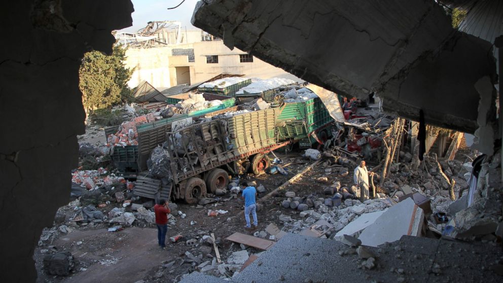 Aid is seen strewn across the floor in the town of Orum al-Kubra on the western outskirts of the northern Syrian city of Aleppo, Sept. 20, 2016, the morning after a convoy delivering aid was hit by a deadly air strike.