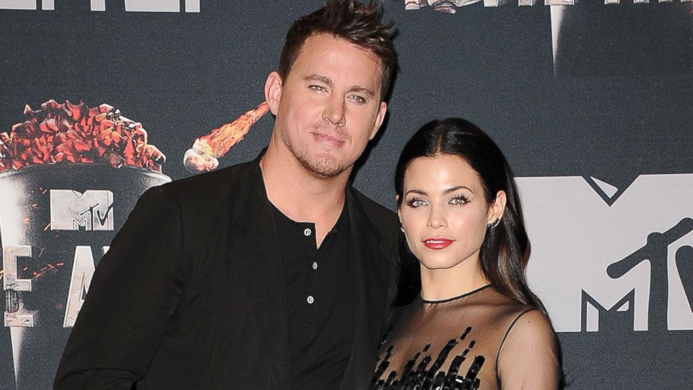 Channing Tatum and actress Jenna Dewan-Tatum pose in the press room at the 2014 MTV Movie Awards at Nokia Theatre L.A. Live, April 13, 2014, in Los Angeles.