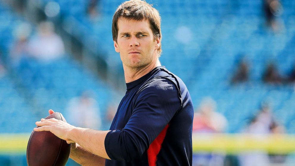 Tom Brady #12 of the New England Patriots warms up before the game against the Miami Dolphins at Sun Life Stadium, Jan. 3, 2016, in Miami Gardens, Florida.