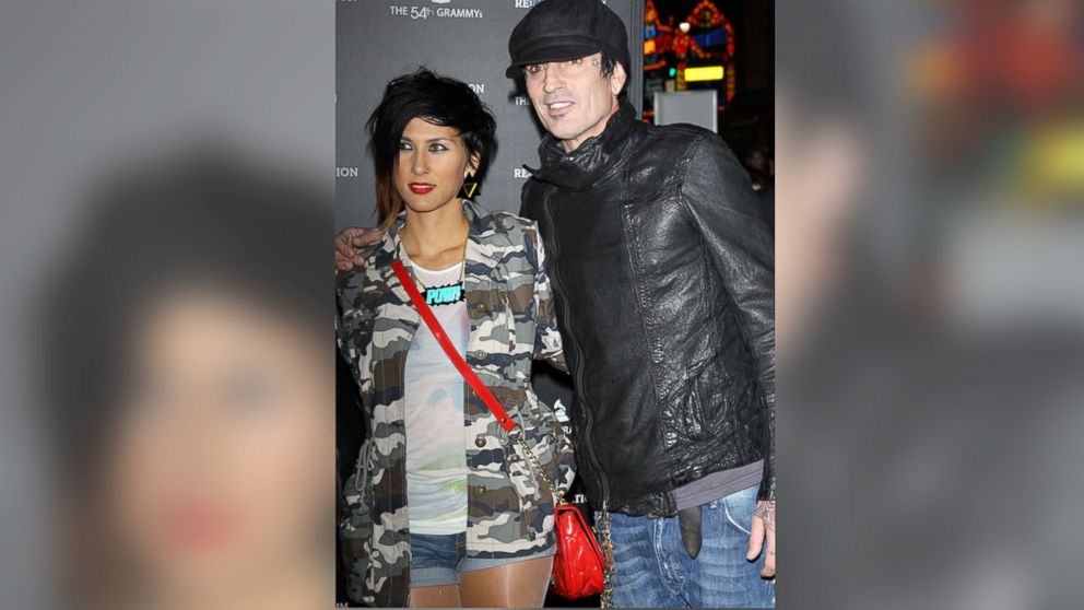 Tommy Lee, right, and girlfriend, Sofia Toufa arrive at the Los Angeles premiere of 'Re:Generation Music Project' in this Feb. 9, 2012, file photo. 