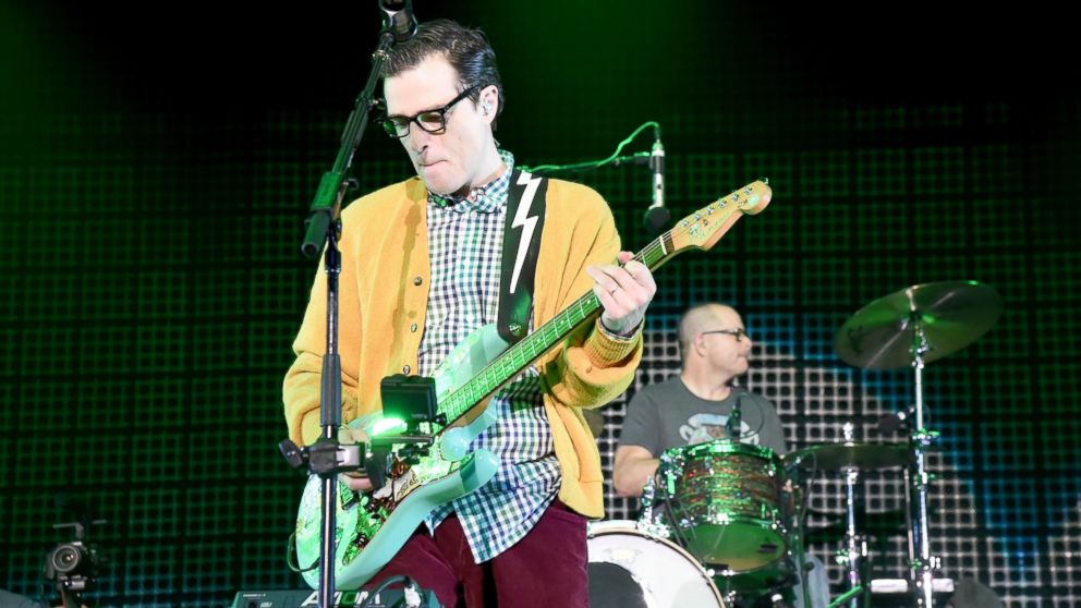 Musicians Rivers Cuomo and Patrick Wilson of Weezer perform onstage during 106.7 KROQ Almost Acoustic Christmas 2015 at The Forum, Dec. 12, 2015, in Inglewood, Calif.