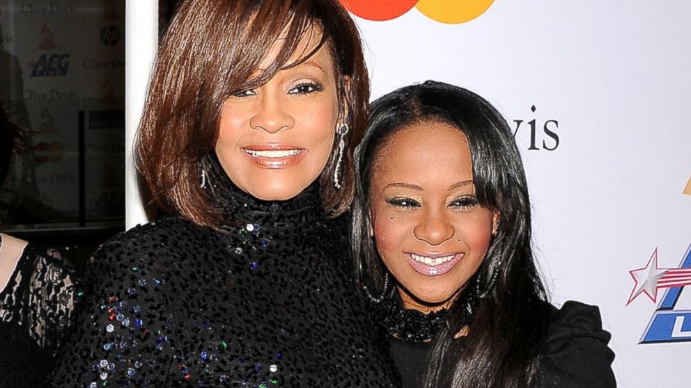 Whitney Houston and Bobbi Kristina Brown arrive at the Clive Davis and The Recording Academy's 2011 Pre-GRAMMY Gala at The Beverly Hilton hotel, Feb. 12, 2011, in Beverly Hills, Calif.