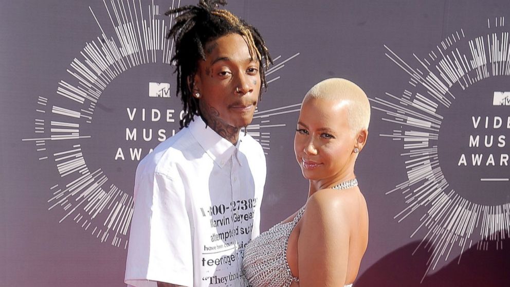 Wiz Khalifa and Amber Rose arrive at the 2014 MTV Video Music Awards at The Forum, Aug. 24, 2014, in Inglewood, Calif.