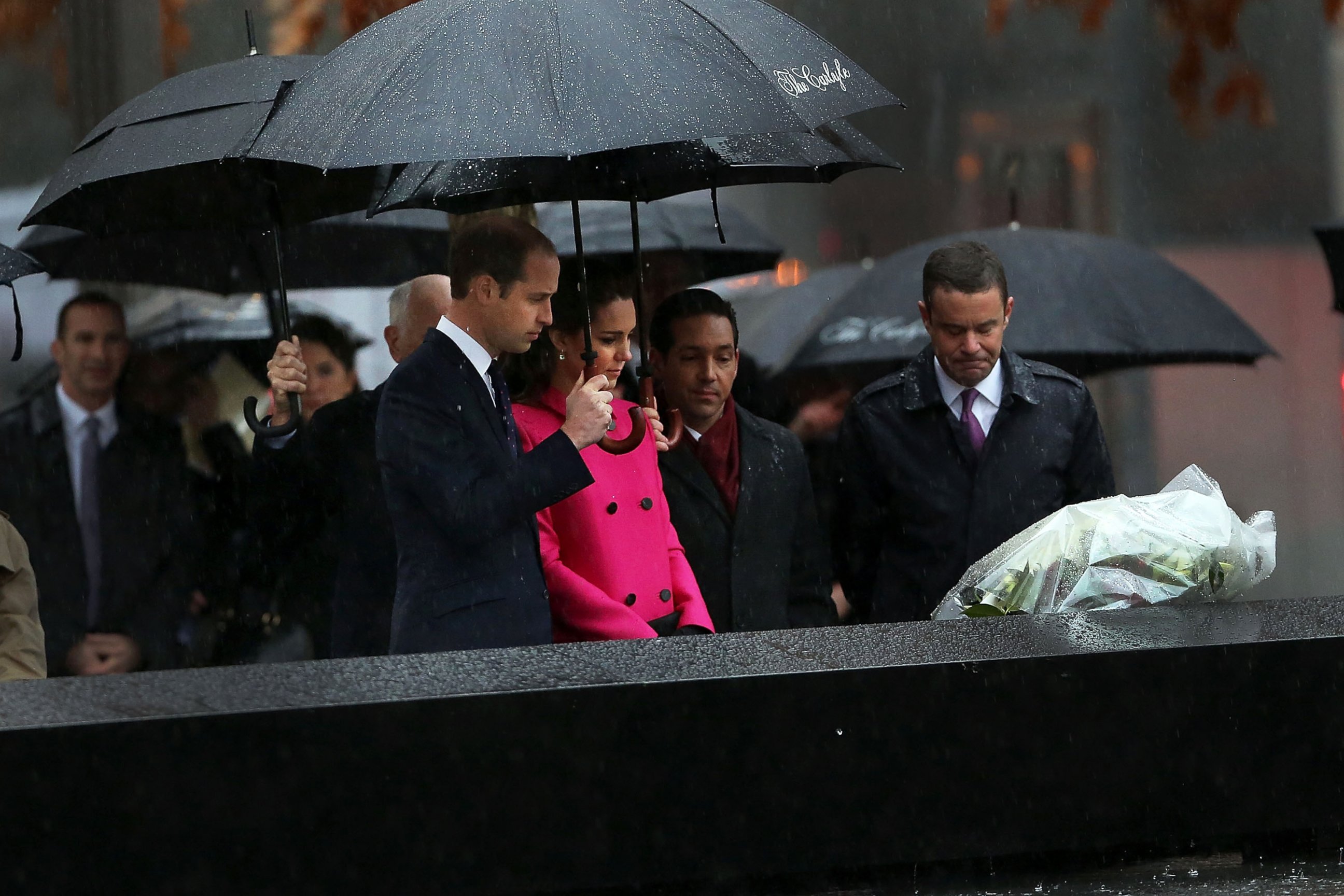 PHOTO: Prince William, Duke of Cambridge and Catherine, Duchess of Cambridge, pause for a moment of silence after laying a wreath at the National September 11 Memorial and Museum on Dec. 9, 2014 in New York City.