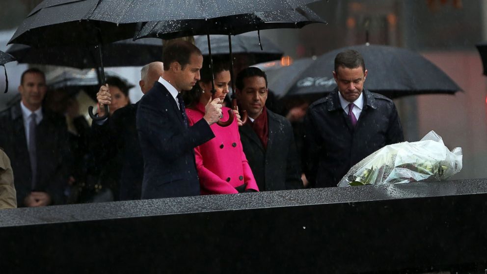 PHOTO: Prince William, Duke of Cambridge and Catherine, Duchess of Cambridge, pause for a moment of silence after laying a wreath at the National September 11 Memorial and Museum on Dec. 9, 2014 in New York City.