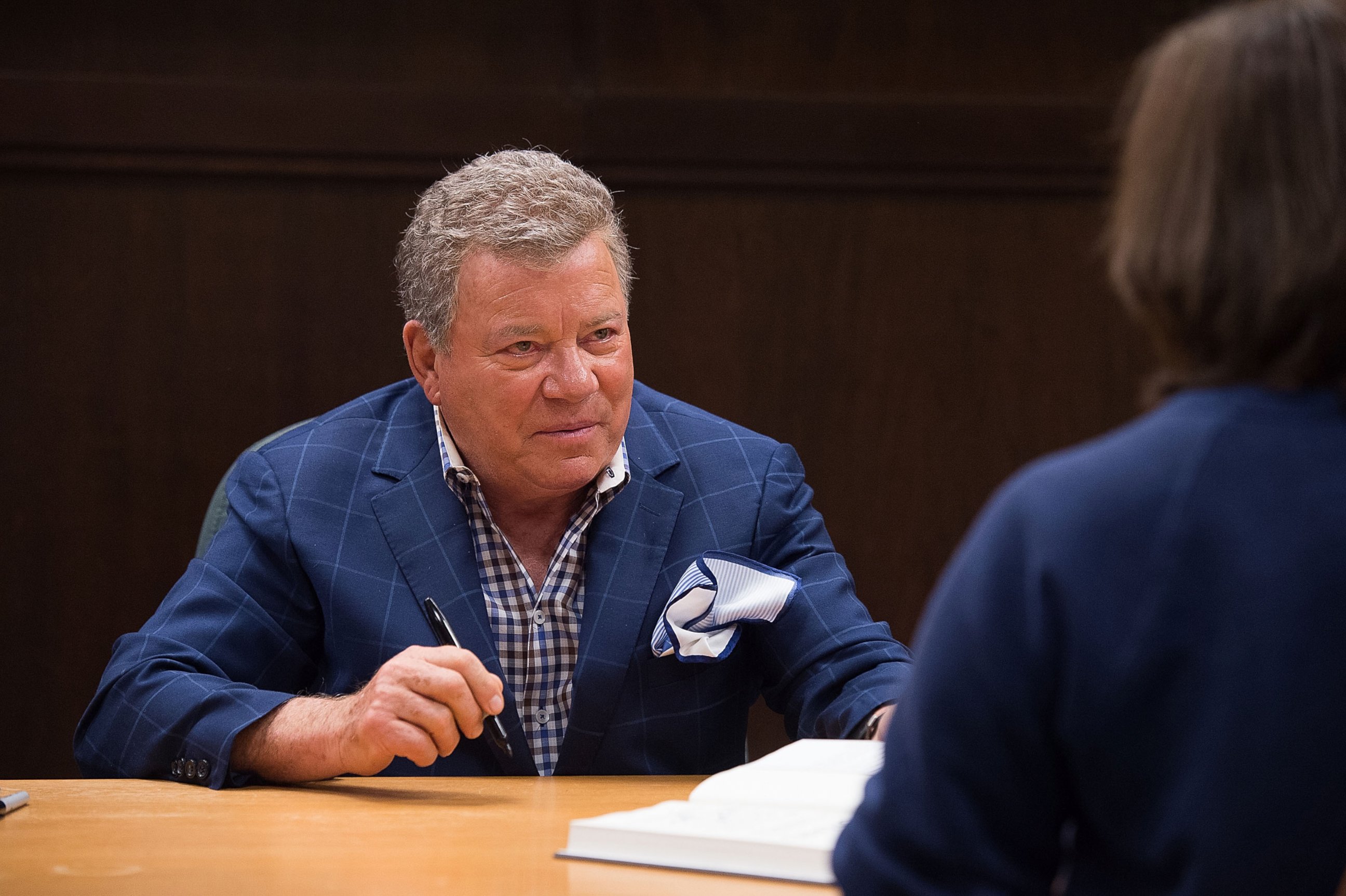 PHOTO: William Shatner signs his new book "Leonard: My Fifty-Year Friendship with a Remarkable Man," Feb. 18, 2016 in Los Angeles, California.