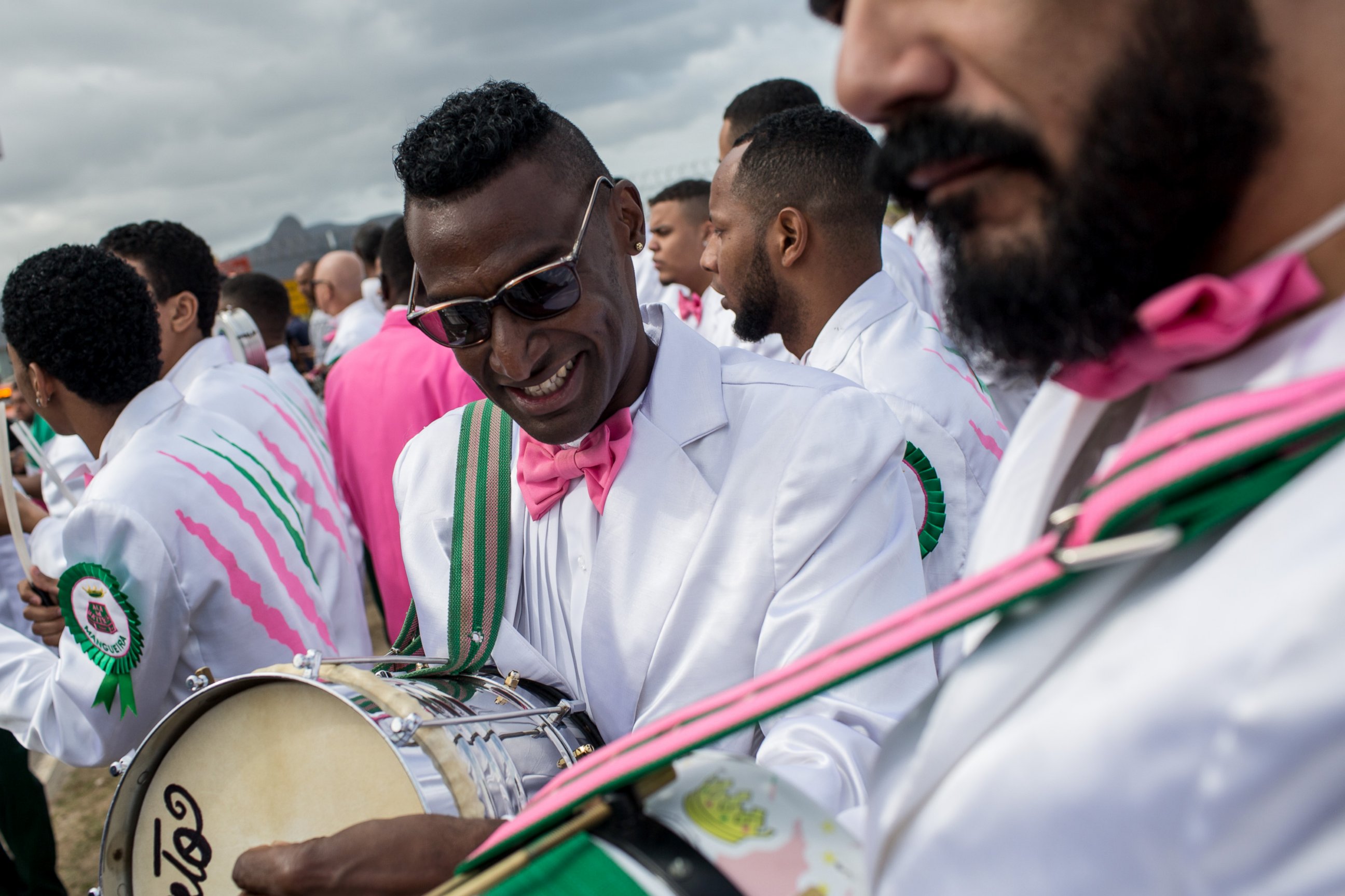 PHOTO: Band members from the Mangueira samba school play music while waiting for the arrival of the Olympic flame ahead of the Rio 2016 Olympic Games , August 3, 2016 in Rio de Janeiro, Brazil. 