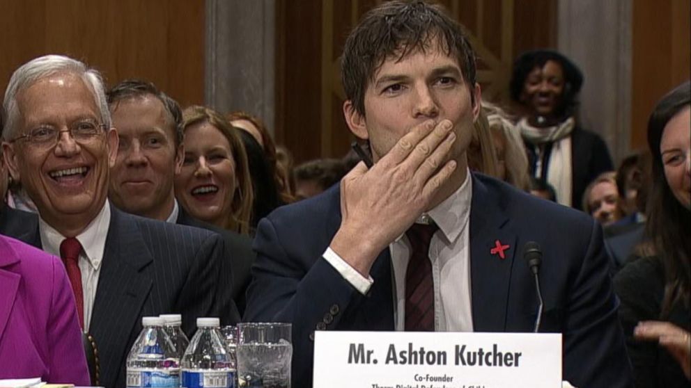 PHOTO: Actor Ashton Kutcher blows Sen. John McCain a kiss at the start of his testimony before a Senate Foreign Relations Committee hearing, Feb. 15, 2017, in Washington, DC. 