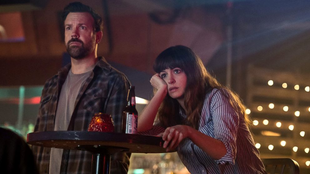 Jason Sudeikis, as Oscar, left, and Anne Hathaway, as Gloria, in a scene from "Colossal."