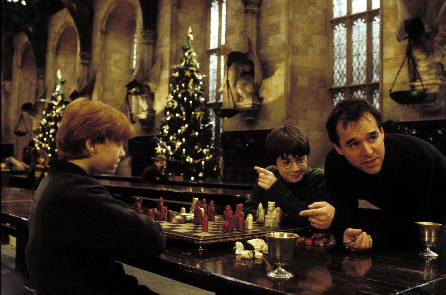 PHOTO: Director Chris Columbus is seen with Rupert Grint, left and Daniel Radcliffe on the set of "Harry Potter and the Sorcerer's Stone."
