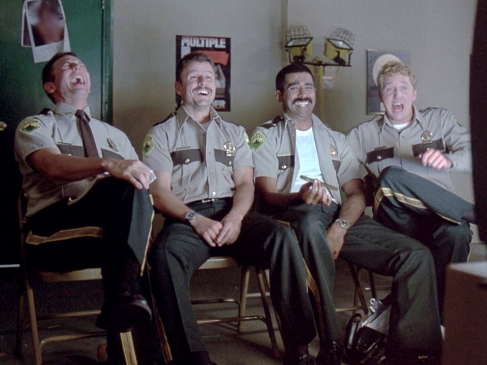 PHOTO: Cast of from the movie "Super Troopers" react in a scene.
