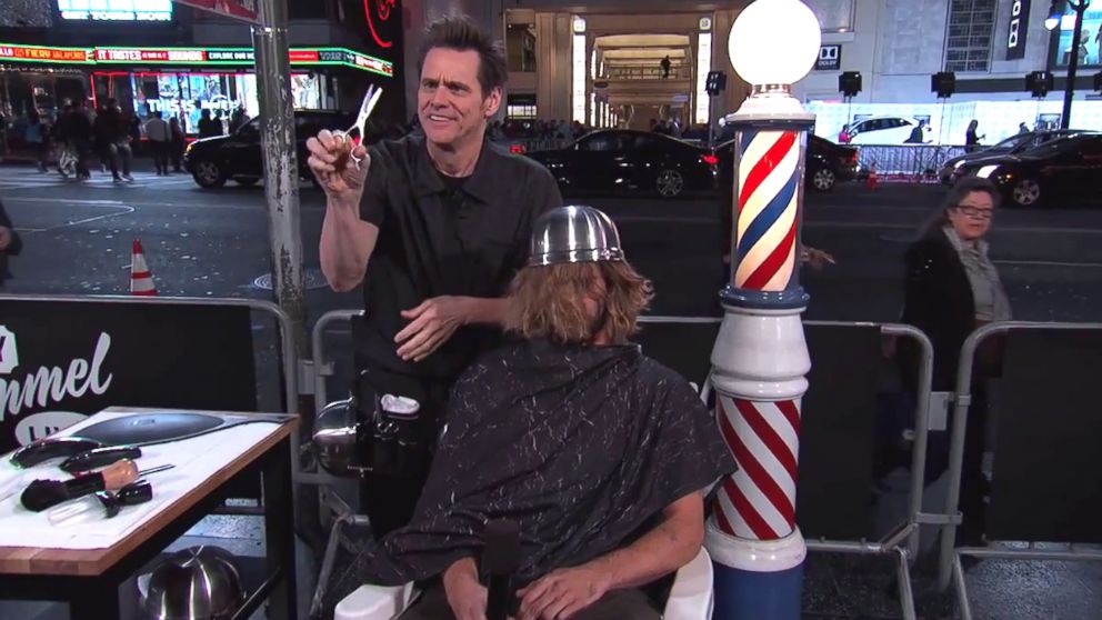 PHOTO: Jim Carrey prepares to cut a stranger's hair on "Jimmy Kimmel Live," Nov. 13, 2014.
