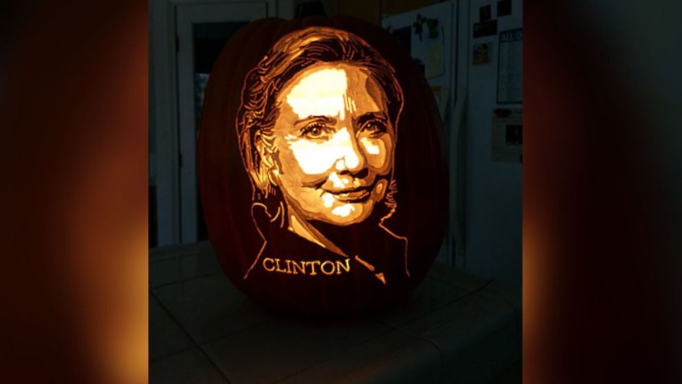 PHOTO: Award-winning artist Alex Wer, also known as "The Pumpkin Geek," carved a pumpkin portrait of presidential candidates Hillary Clinton.