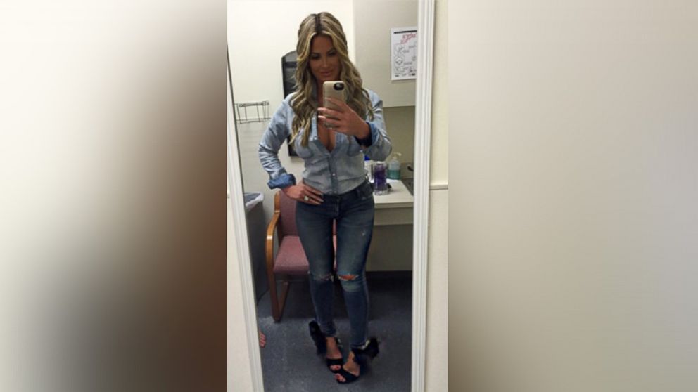 Kim Zolciak-Biermann posted this photo on Instagram with this caption: "My feisty followers want me to take my pics closer up so you guys can see the detail!! How's this and listen I turn my feet in so you can see my damn shoe not to have a thigh gap cause I have that anyway!!" Aug. 19, 2015.