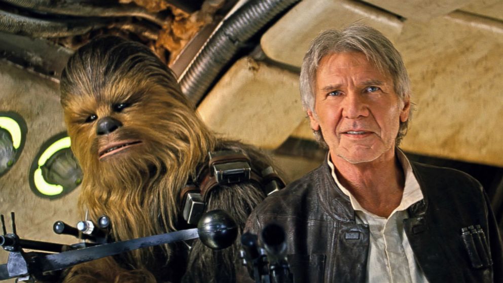 Joonas Suotamo as Chewbacca and Harrison Ford as Han Solo in a scene from "Star Wars: The Force Awakens."