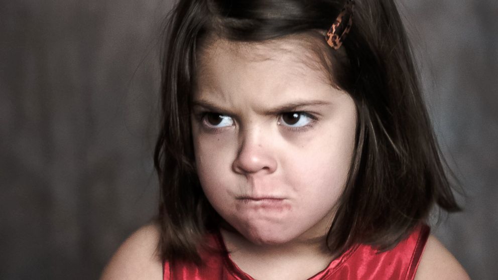 Ceci Negron, 5, did not smile in her yearbook photo.