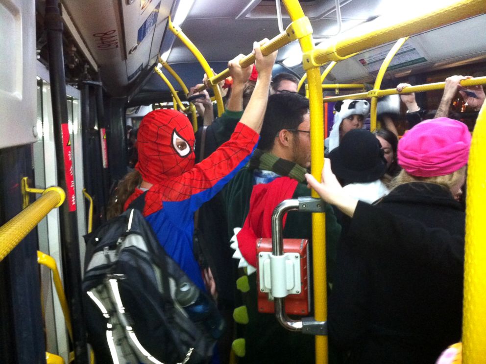 PHOTO: Commuters are seen in costume on the subway line 2 in Beijing, Nov. 1, 2013.