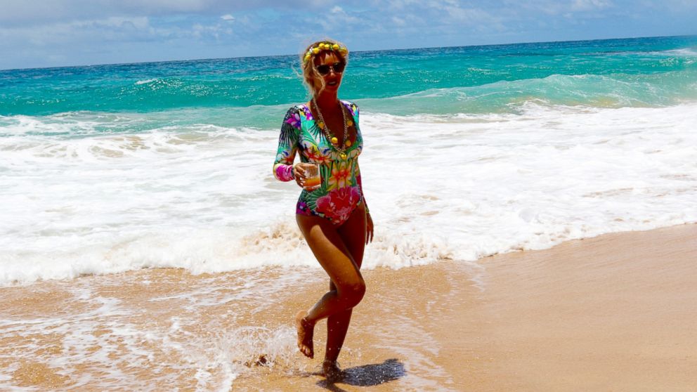 Beyonce is seen on her vacation with husband Jay-Z, not pictured, and daughter Blue Ivy, not pictured, in a series of photos she shared on her website.