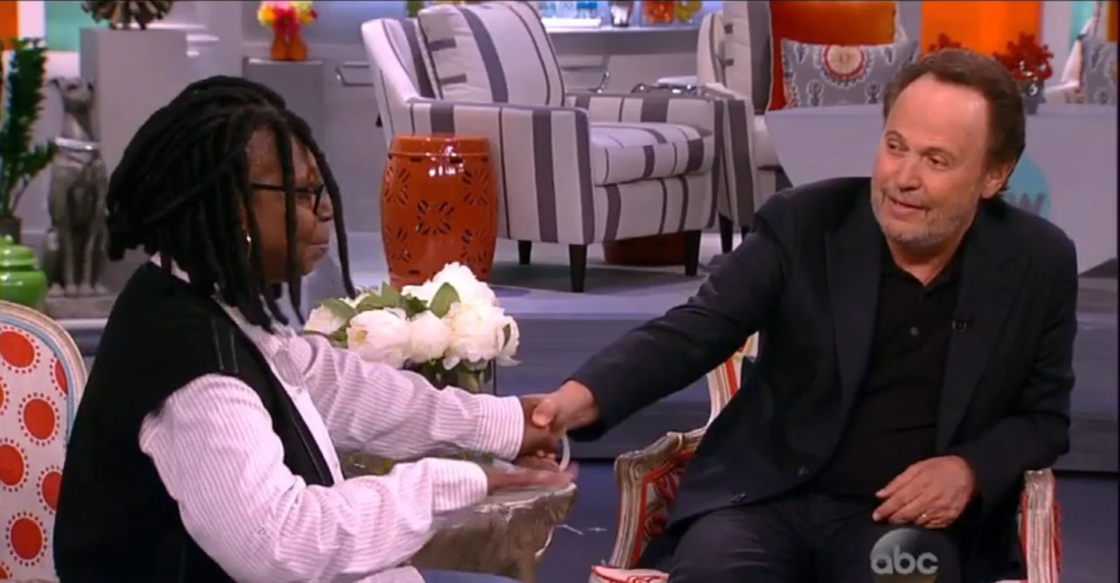 PHOTO: Whoopi Goldberg speaks with Billy Crystal about fellow comedian and friend Robin Williams on an episode of The View, Sept. 19, 2014.