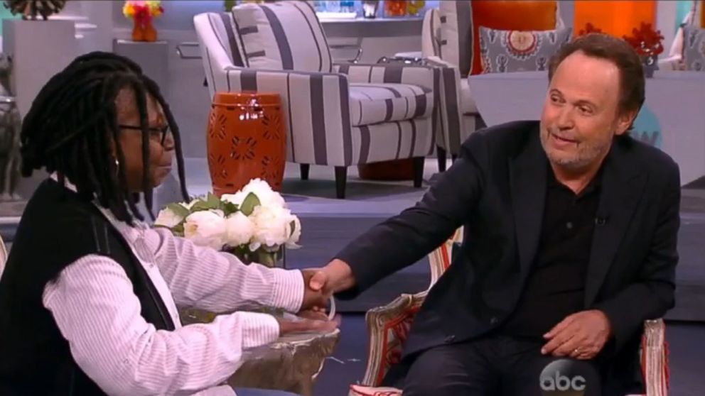 PHOTO: Whoopi Goldberg speaks with Billy Crystal about fellow comedian and friend Robin Williams on an episode of The View, Sept. 19, 2014.