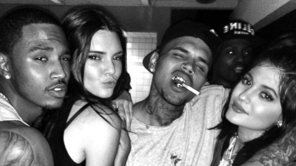 Trey Songz and and Chris Brown are seen in a photo alongside Kendall and Kylie Jenner posted to Treysonz’s Instagram account on July 27, 2014. 