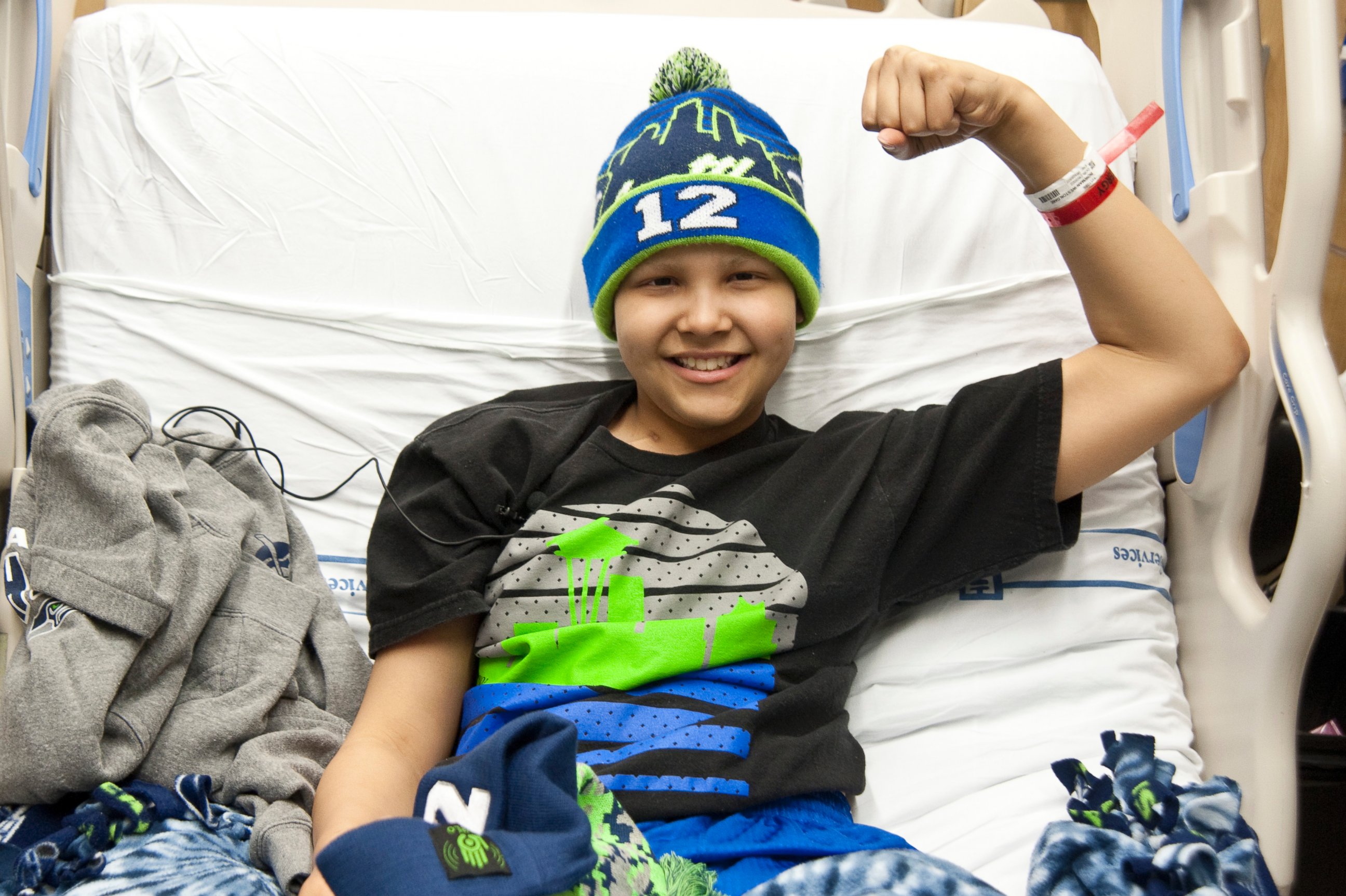 PHOTO: Seattle Children's Hospital patient, Dane Bowman-Weston flexes for Strong Against Cancer, Jan. 27, 2015.