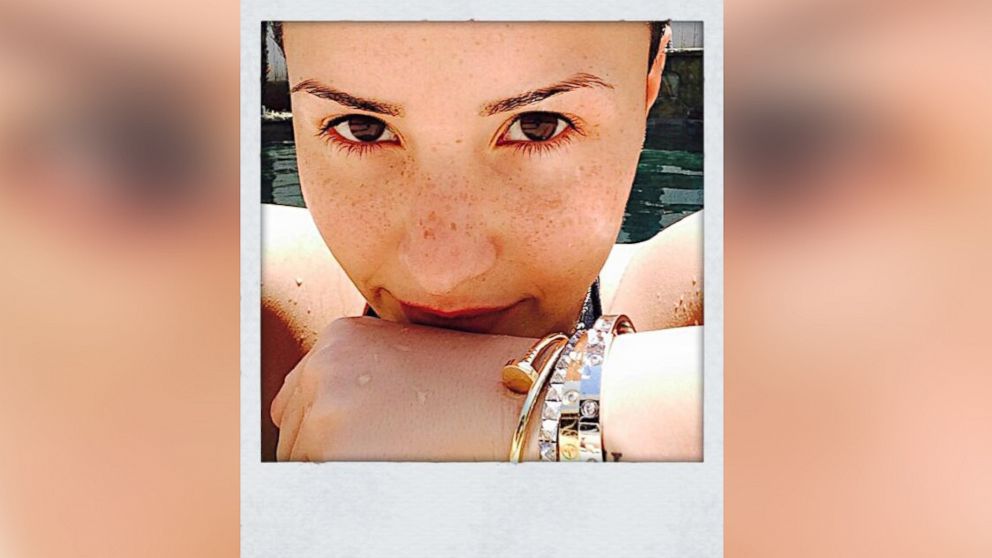 Demi Lovato posted this photo to her Twitter, June 17, 2014, with the caption, "Freckles."
