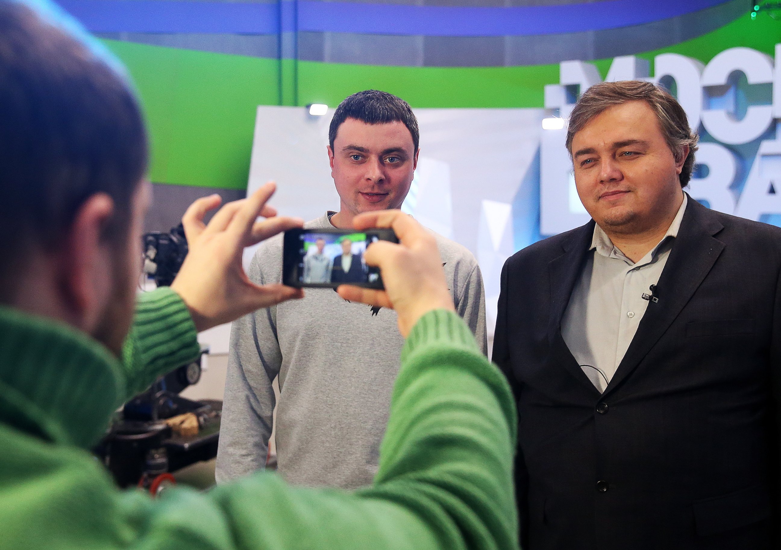 PHOTO: Roman Burtsev, right, a Russian doppelganger of American actor Leonardo DiCaprio, poses for a photograph after giving an interview to Moscow 24 TV Channel. 