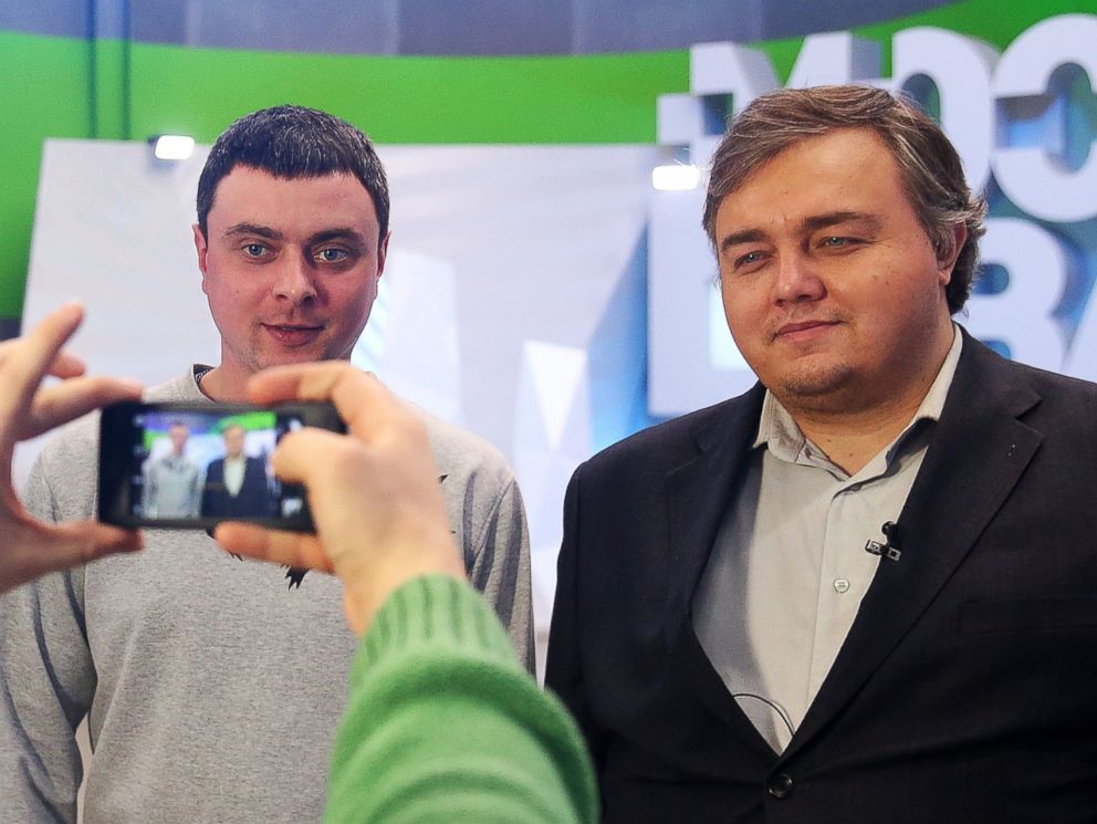PHOTO: Roman Burtsev, right, a Russian doppelganger of American actor Leonardo DiCaprio, poses for a photograph after giving an interview to Moscow 24 TV Channel.