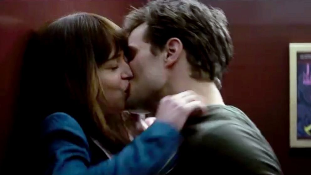Dakota Johnson as Anastasia Steele and Jamie Dornan as Christian Grey in the "Fifty Shades of Grey" trailer.