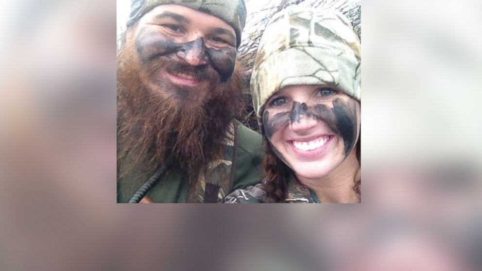 Duck Dynasty star Justin Martin, left, and fiancée Brittany Brugman are seen in this undated file photo.
