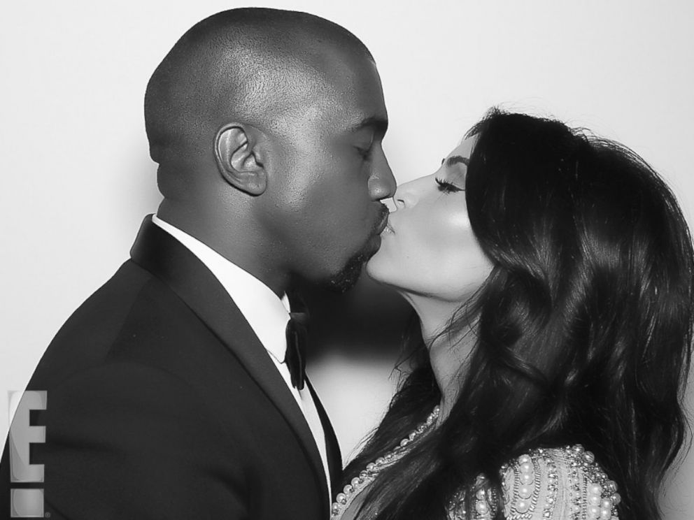 PHOTO: Kanye West and Kim Kardashian kiss shortly after their nuptials took place at Forte di Belvedere in Florence, Italy, May 24, 2014. <a href="http://www.eonline.com/news/545405/kim-kardashian-and-kanye-west-s-first-photos-as-a-married-couple-see-the-