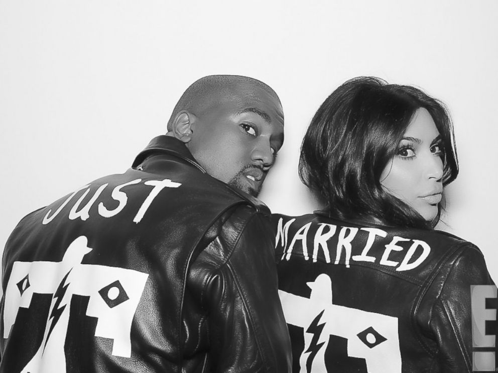 PHOTO: Kanye West and Kim Kardashian wear matching jackets shortly after their nuptials took place at Forte di Belvedere in Florence, Italy, May 24, 2014.<a href="http://www.eonline.com/news/545405/kim-kardashian-and-kanye-west-s-first-photos-as-a-married